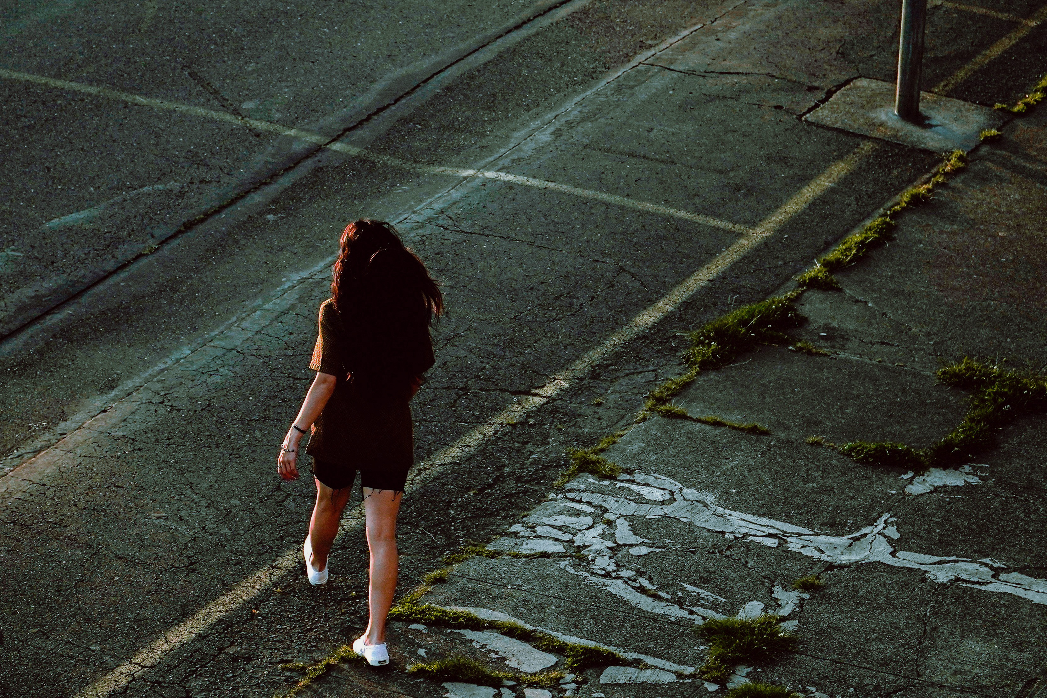 Person walking away outdoors